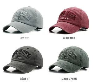 Detail view of four vintage washed cotton baseball caps with New York 1625 embroidery