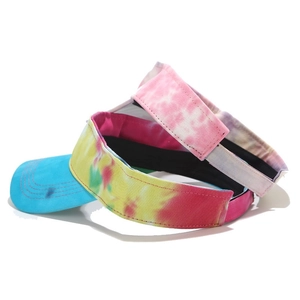 Colorful tie-dye sun visor hat for women with vibrant blue brim and cotton canvas texture