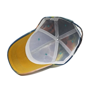 Detailed interior of a 100% cotton baseball cap with tie-dye lining and reinforced stitching