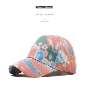 Detail of colorful tie-dye canvas baseball cap with high-quality stitching and texture