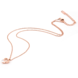 Rose gold heart pendant necklace featuring interlocking rings and sparkling crystal on O-chain
