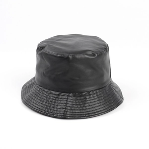 Detail of premium black PU leather bucket hat with reinforced stitching on the brim