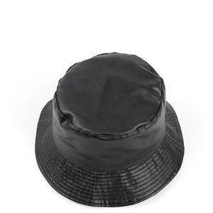 Detail view of black PU leather bucket hat showing textured finish and stitched brim