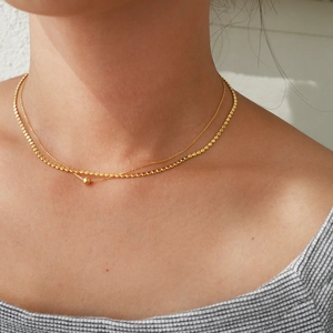 Chic 925 sterling silver double-layer gold necklace featuring tiny round disc pendants