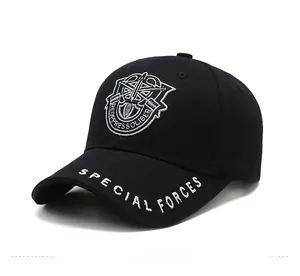 Detail view of military baseball cap featuring Special Forces embroidery and silver shield patch