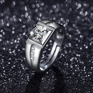 Macro shot of silver men's adjustable ring with round brilliant cut zircon and halo stones