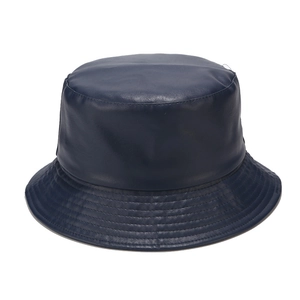 Detail of navy blue PU leather bucket hat with reinforced stitching on the brim