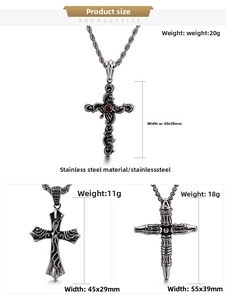 Detailed view of three vintage gothic stainless steel cross pendants with dimensions