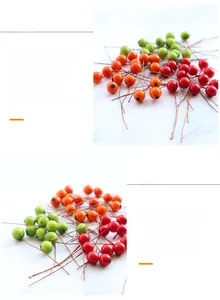 Detailed close-up of colorful artificial berries in red, orange, and green for DIY decor