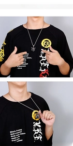 Model wearing realistic wolf head pendant with silver twisted rope chain necklace for men
