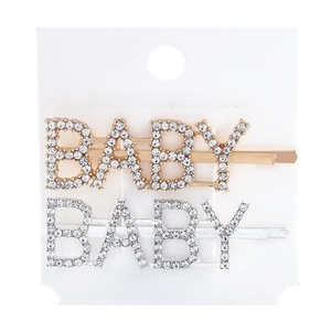 Detailed view of silver and gold metal hair clips with BABY letter rhinestone inlay