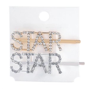 Detailed close-up of gold and silver STAR hair clips with sparkling rhinestones set