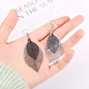 Exaggerated double-layered hollow leaf drop earrings in black and silver punk style