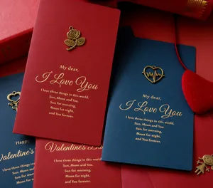 Detail of vintage greeting cards with metallic charms and gold foil romantic poems