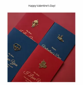 Detailed view of vintage gold embossed thank you cards with ornate metal pendants
