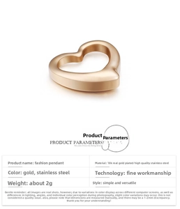 Detail of 18K gold plated heart pendant in stainless steel showing exact weight and size