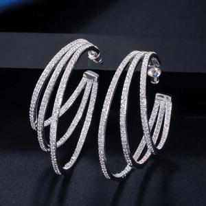 Three-layer irregular C-shaped hoop earrings with silver finish and cubic zirconia