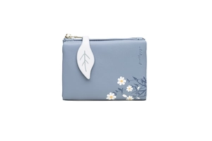 Detailed view of blue PU leather wallet with daisy floral print and leaf shaped zipper