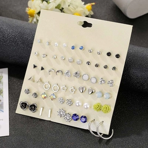 Detailed set of 30 pairs of mixed alloy stud earrings with crystals and faux pearls