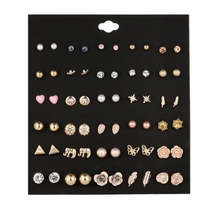 Detail view of 30 pairs alloy stud earrings with rhinestones, pearls, and flowers set