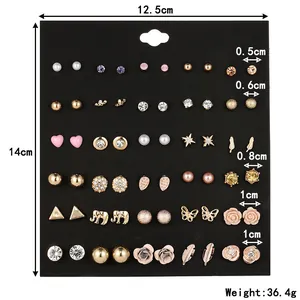 Size chart for crystal flower earring set showing dimensions from 12.5x14cm and weights