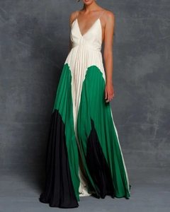 Detail of the deep V-neckline and tricolor pleated stitching on the maxi dress