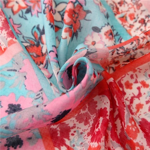 Close-up of bohemian paisley floral print on soft cotton linen scarf fabric