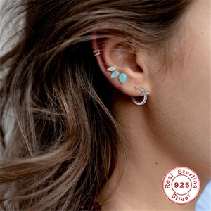 925 sterling silver hoop earrings with diamond cross and light blue gemstone charms