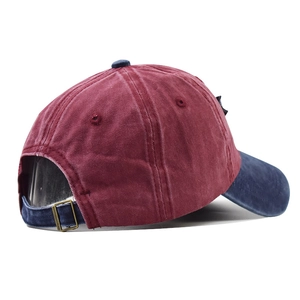 Detail view of the vintage washed canvas baseball cap with adjustable bronze buckle