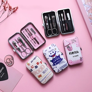 Detail of cute cartoon portable manicure set with stainless steel grooming tools