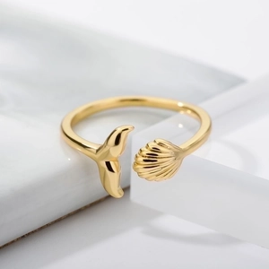 Adjustable 18k gold plated open ring featuring elegant whale tail and seashell motifs