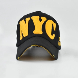 Distressed cotton baseball cap with yellow NYC applique embroidery on black base
