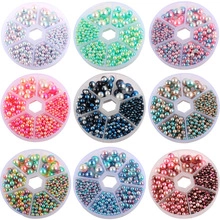 Macro view of assorted 3-5mm mermaid faux pearls in divided DIY jewelry cases