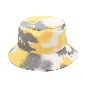 Detail of tie-dye bucket hat with yellow grey marbling and reinforced brim stitching