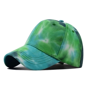 Detail view of cotton tie-dye baseball cap with green and blue gradient finish