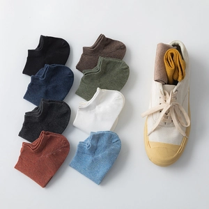 Men's low-cut breathable cotton socks available in 10 diverse colors with a non-slip design