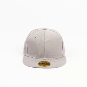 Close-up of light grey flat brim baseball cap with six-panel design and golden sticker