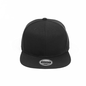 Close-up of black snapback hat with flat brim and silver holographic quality sticker
