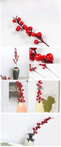 Close-up of artificial red berry branches with glossy finish for Christmas DIY decor