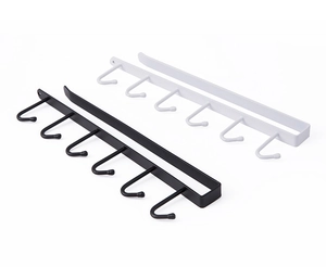 Detail of multi-functional metal under-cabinet hooks in black and white finishes