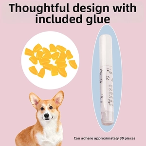 Detail view of bright orange silicone pet nail covers with professional adhesive glue