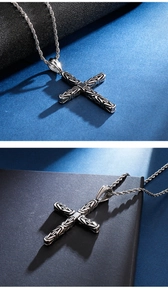 Vue détaillée de la chaîne byzantine en argent et pendentif croix ajouré pour hommes