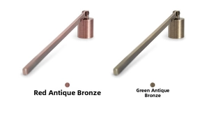 Detail of red and green bronze candle snuffers with a brushed metal finish