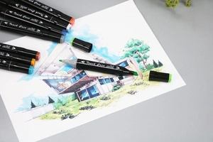 Close-up of Touch Coco dual-tip markers with professional architectural color sketches