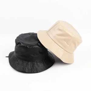 Classic PU leather bucket hats in black and beige with premium stitched brim details