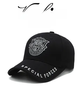 Detail of embroidered badge and Special Forces text on a black tactical baseball cap