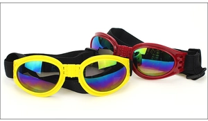 Foldable pet goggles in yellow and burgundy with adjustable straps and reflective lenses
