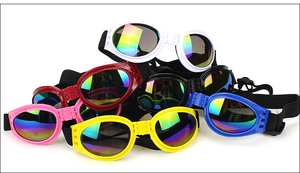 Detailed view of colorful foldable pet sunglasses in six vibrant rainbow lens colors