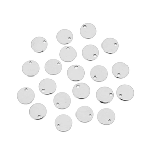 Macro shot of 20 pieces of round silver stainless steel blank pendants with hanging holes