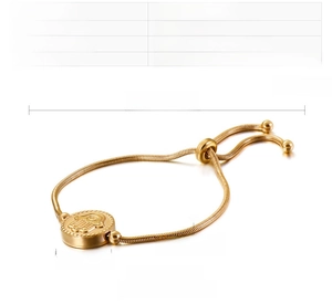 Adjustable stainless steel bracelet featuring a gold Hamsa hand charm and snake chain link